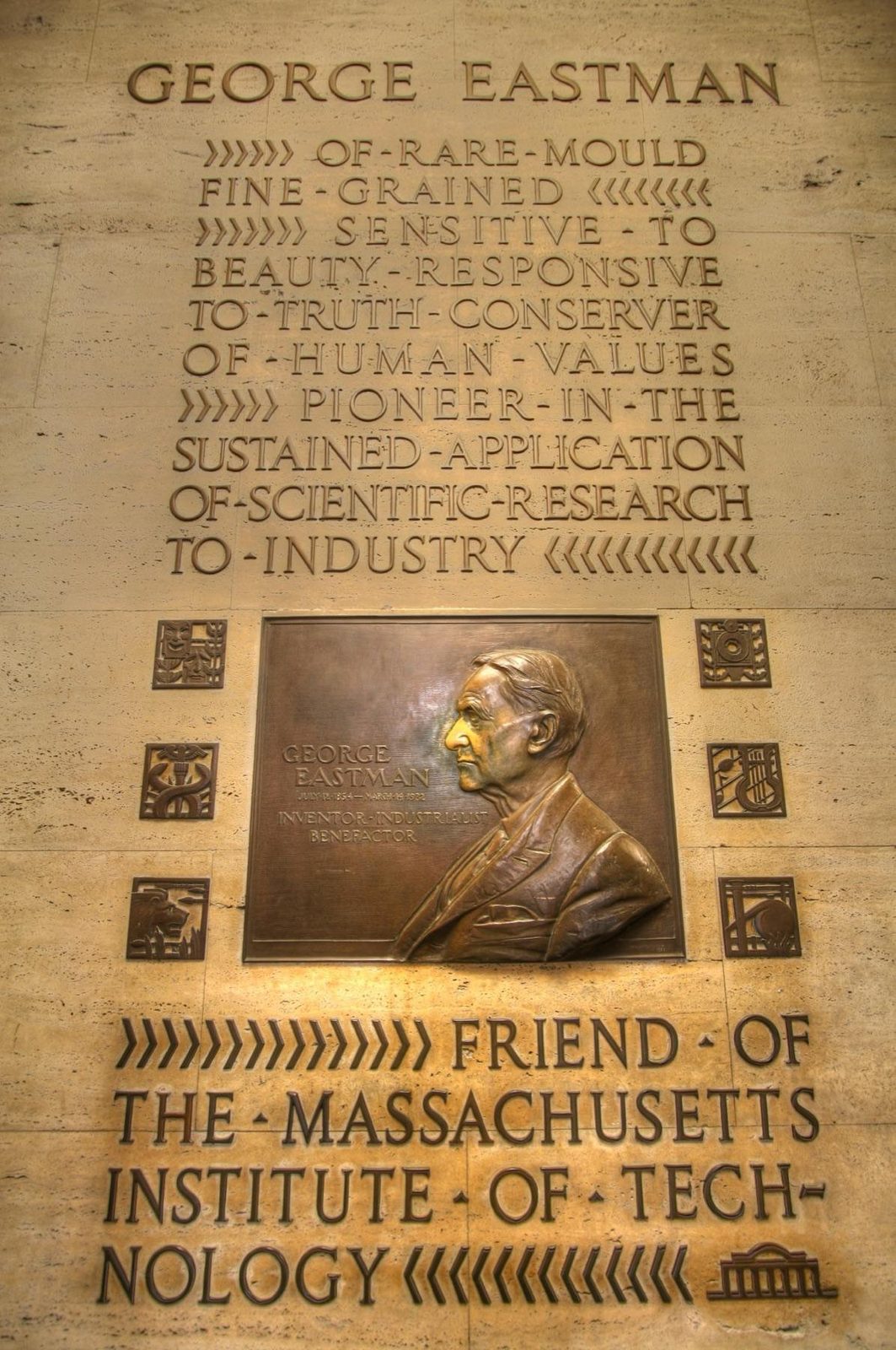 THE GEORGE EASTMAN MEMORIAL IN MIT'S BUILDING 6 CORRIDOR. PHOTO: MADCOVERBOY, WIKIMEDIA COMMONS, CC BY-SA 3.0.